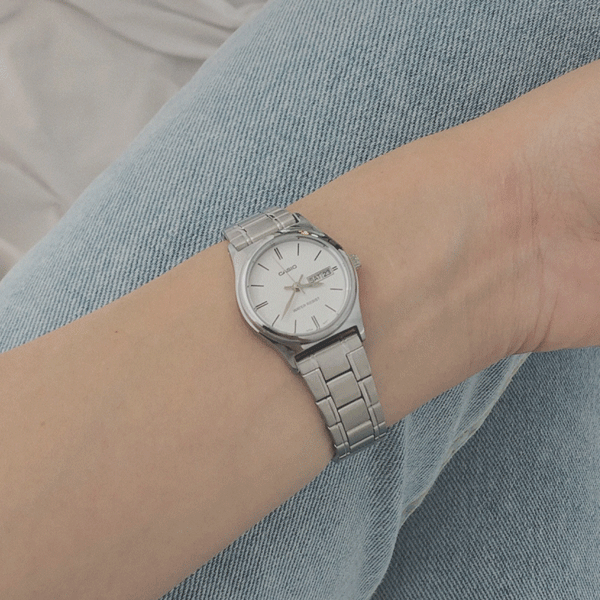 casio round white metal watch